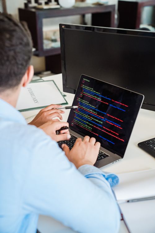 Close-up of a developer's screen showing code being written, illustrating the everyday tooling where small fast models do the heavy lifting