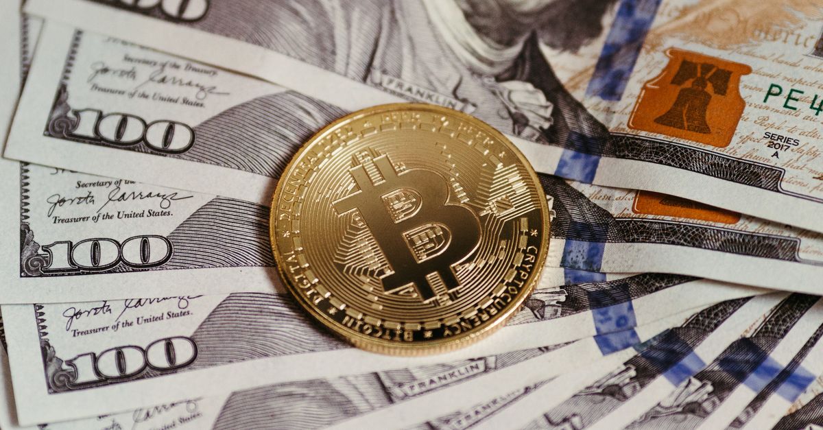 A stack of dollar coins with a digital chart — stablecoins let agents move digital dollars across borders without crypto's price swings