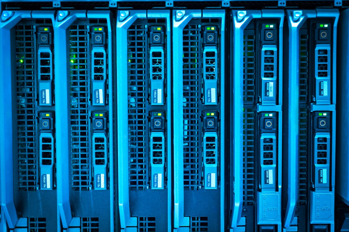 Rows of server hardware in a data center — the physical analogue of an agent estate that needs one inventory across all platforms