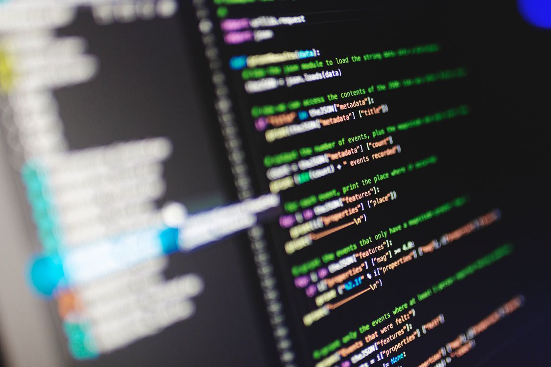 Code on a developer's screen — where agents fetch headers without showing them