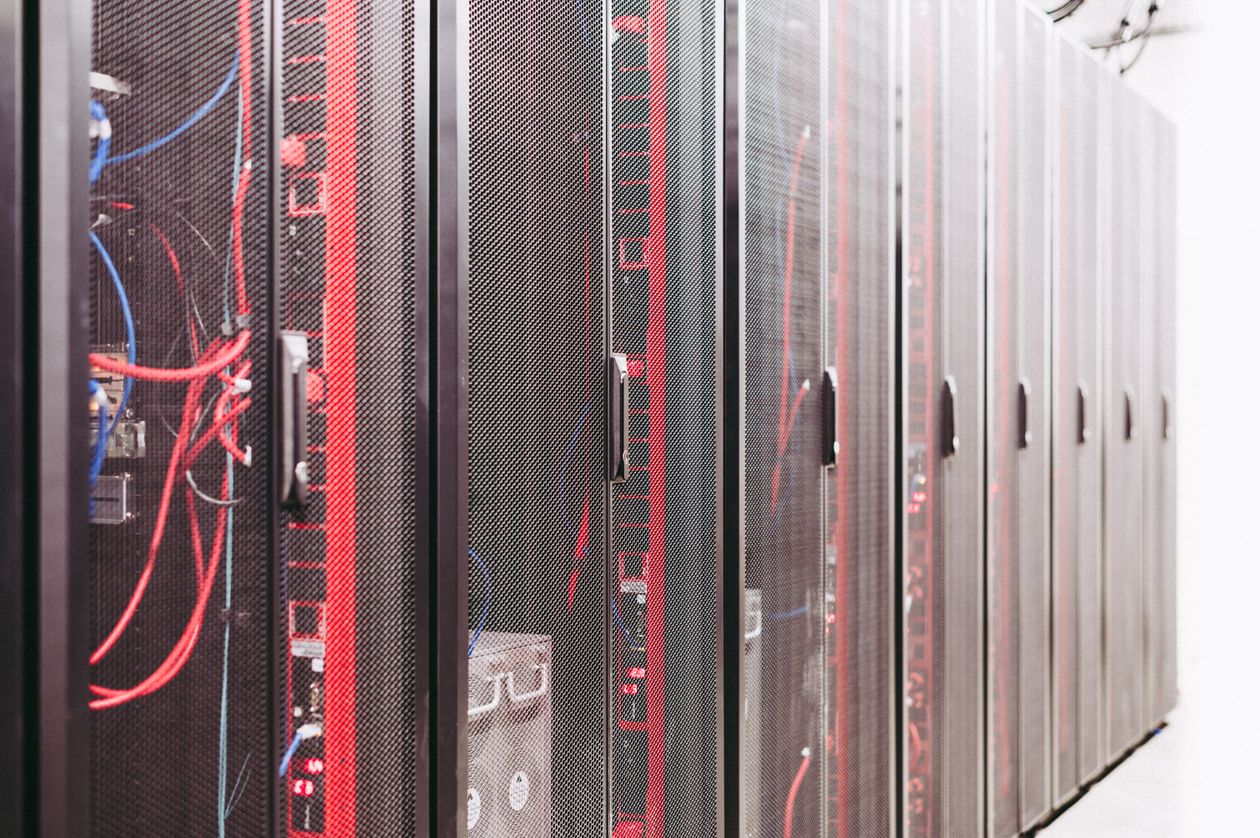 Server racks in a data center — the kind of infrastructure where a 3.0 upgrade needs a rehearsal, not a gamble