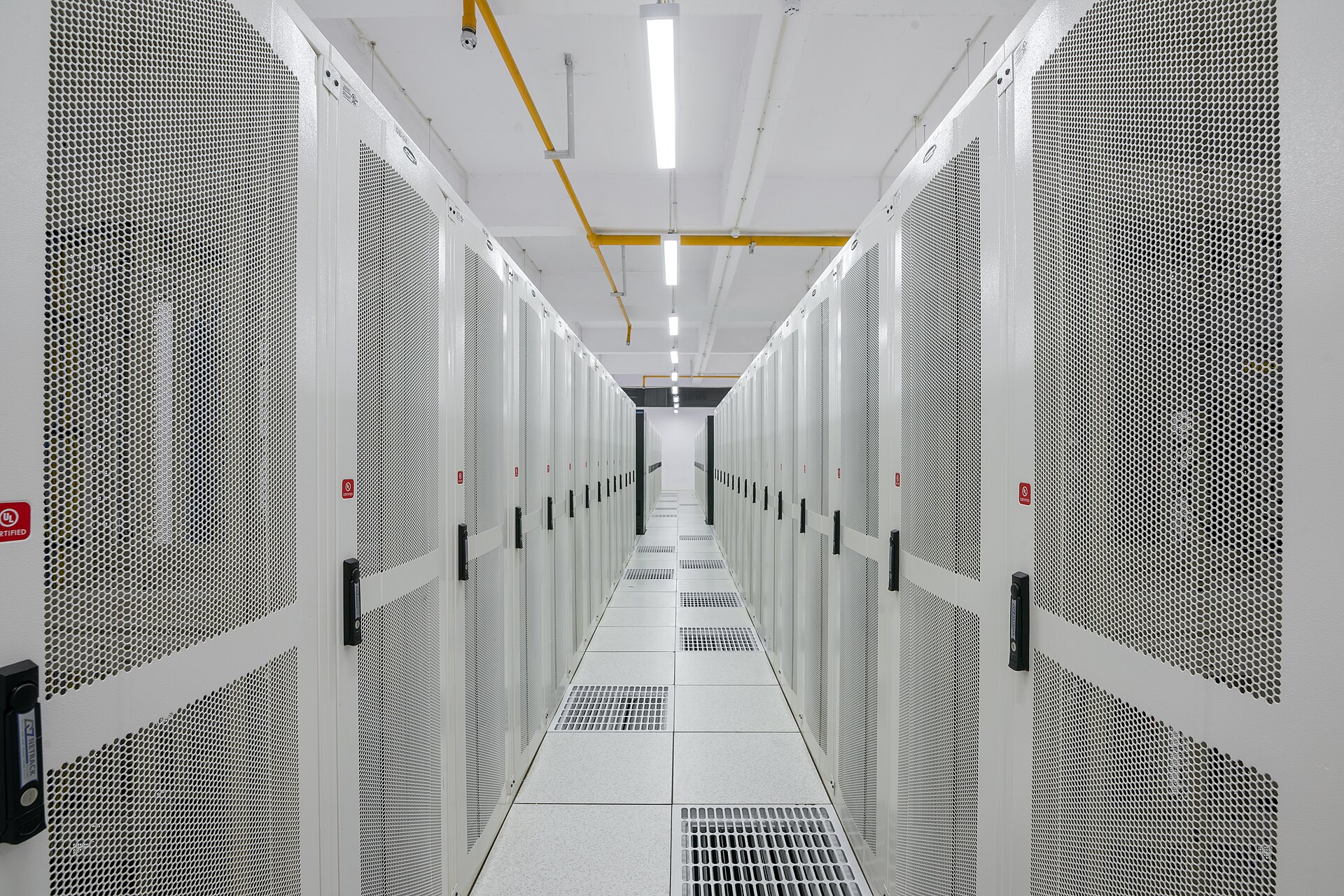 Rows of populated server racks in a data center — the full in-silicon Sentry path runs on data-center-grade hardware like this