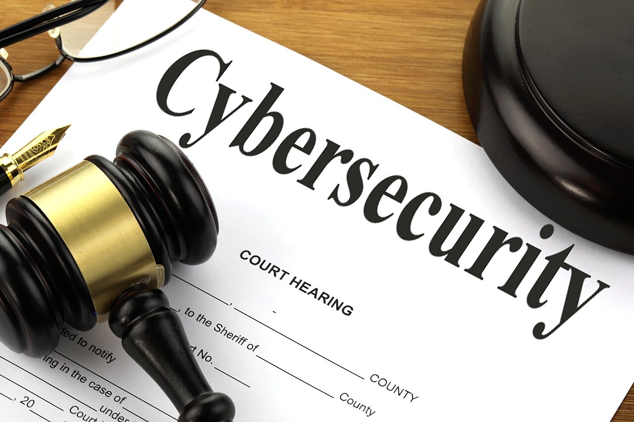 Gavel resting on a cybersecurity court document — the governance question at the center of the firings