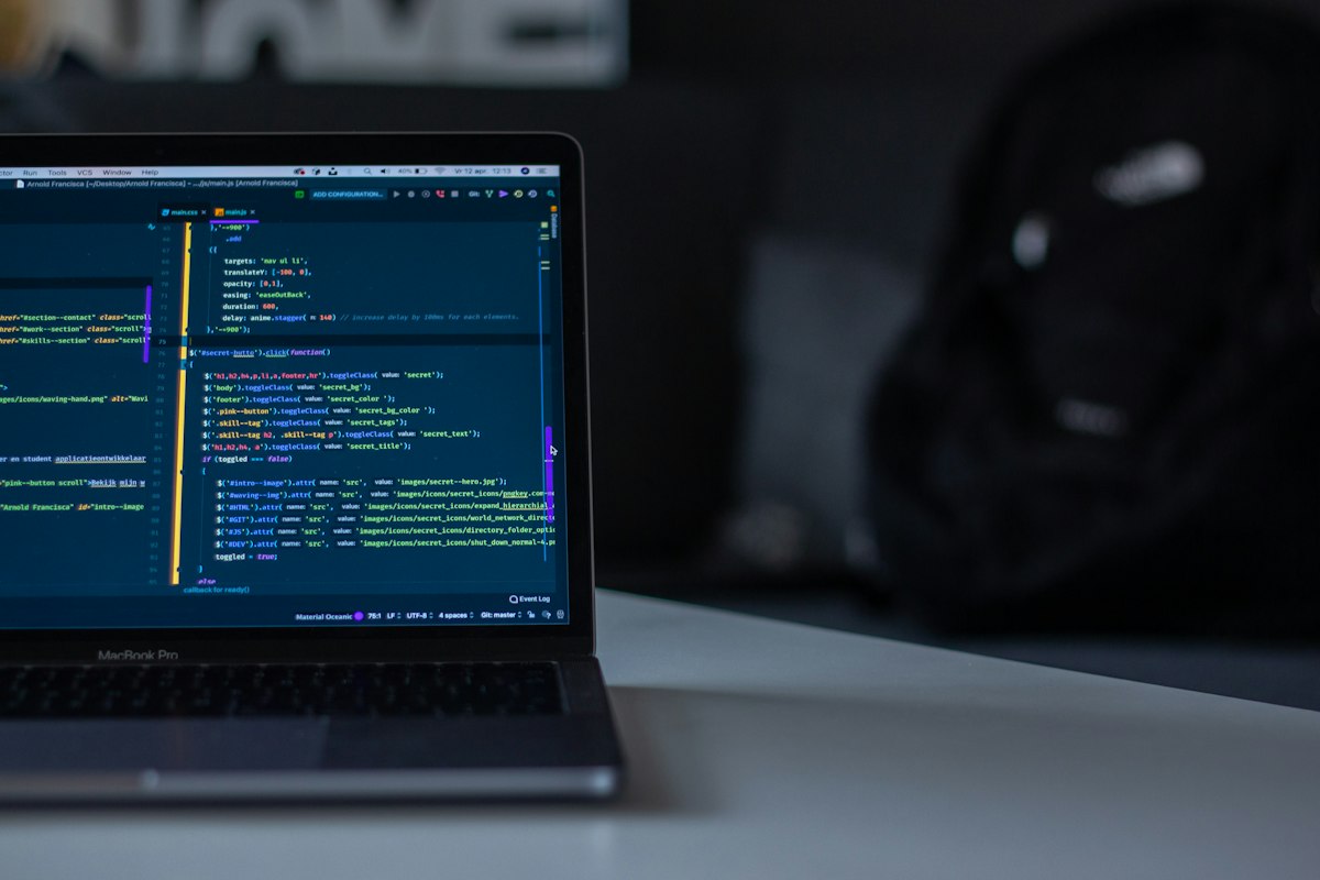 Code editor open on a laptop screen — screenshots of this kind of interface work are what coding agents published publicly