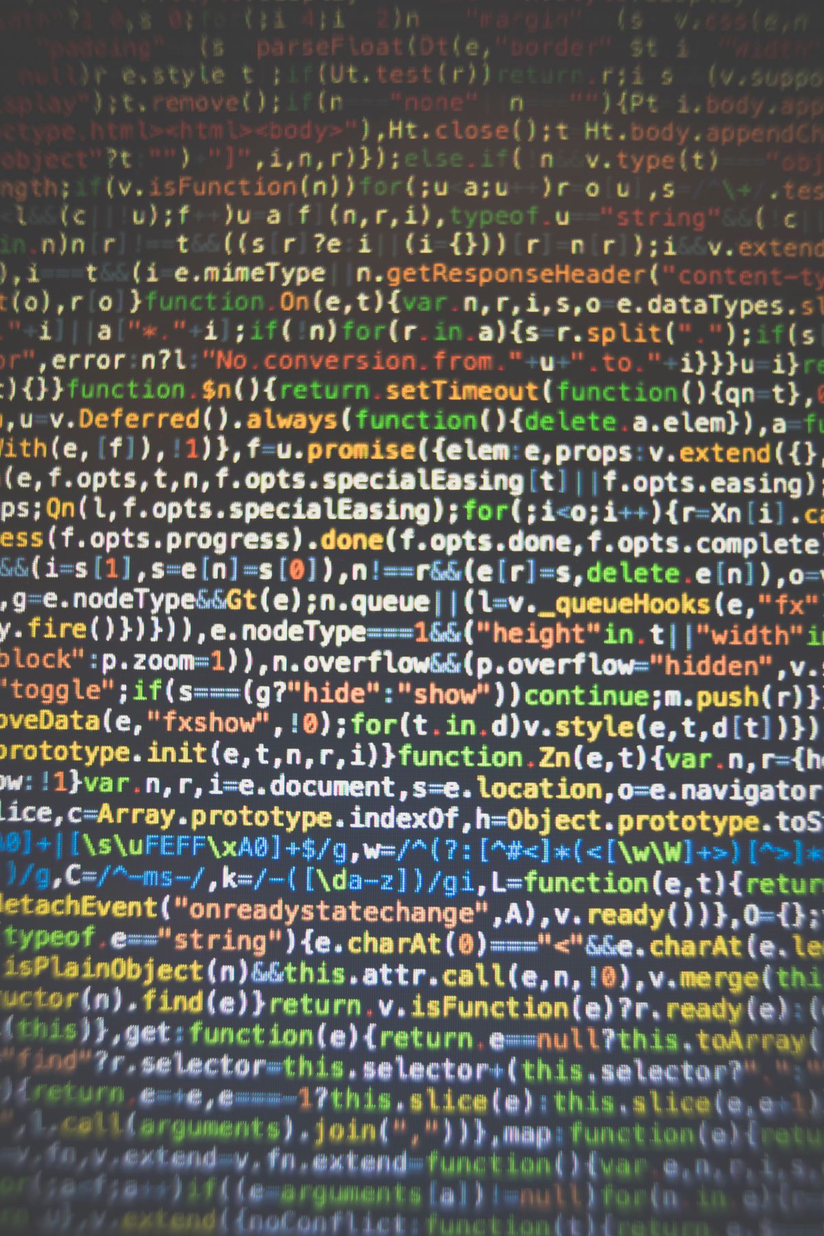 Colorful close-up of syntax-highlighted source code on a screen
