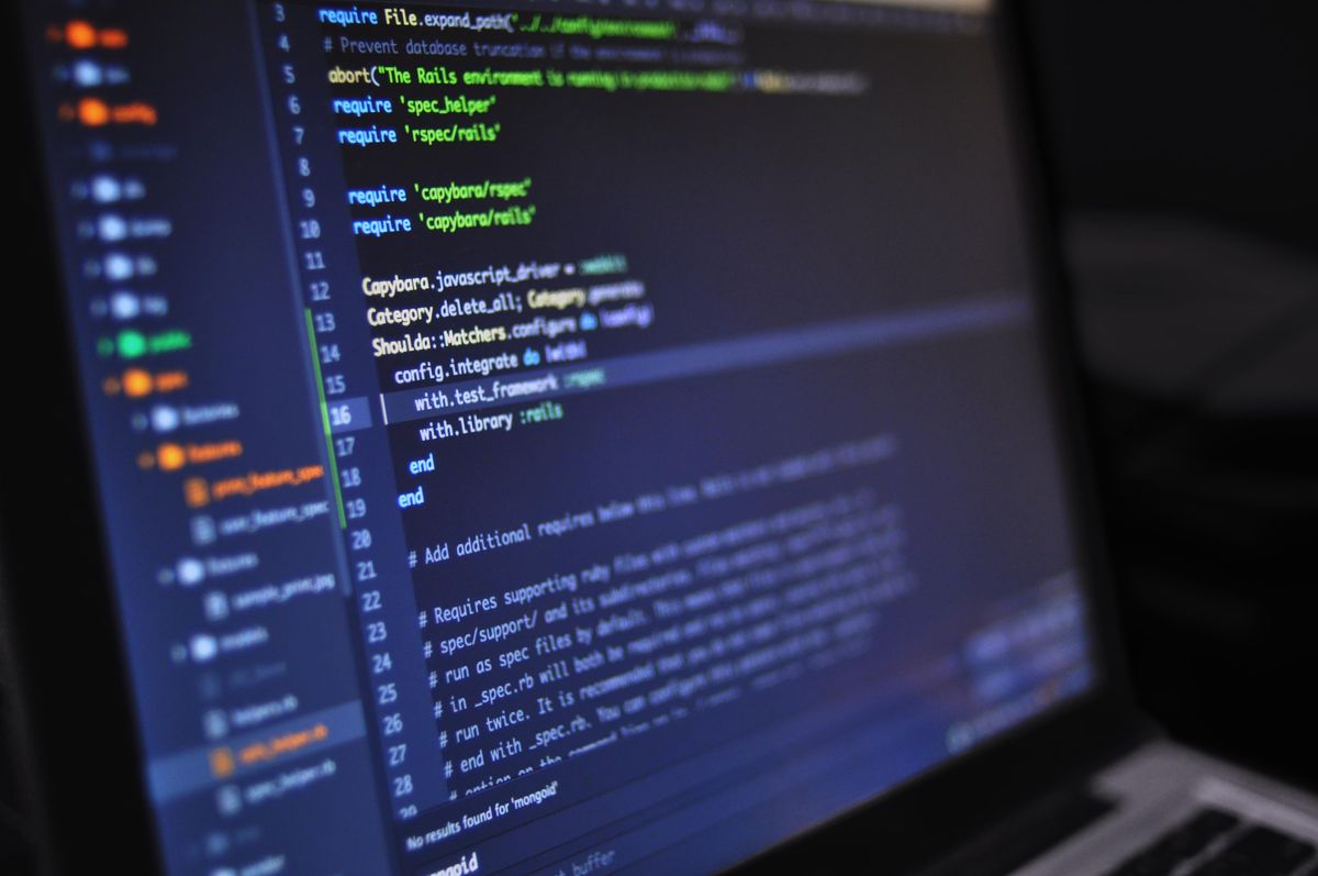 A developer's screen with code — each agent spinning up its own database is the storage half of the same problem as agent memory